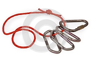 Several different locking and non-lockingÃ¢â¬â¹ carabiners on rope loop photo